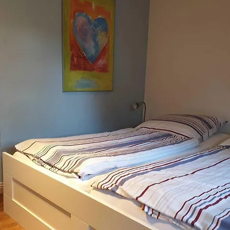 Laerchenshus Reetdachhaus Nyaraló *